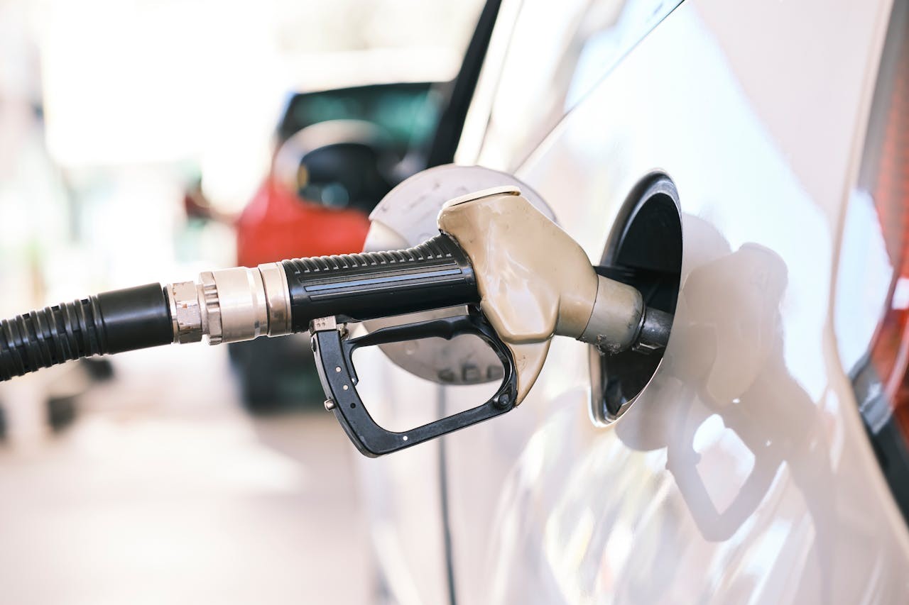 A car being fueled with diesel