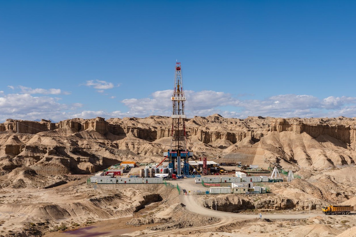 An oil rig in arid terrain